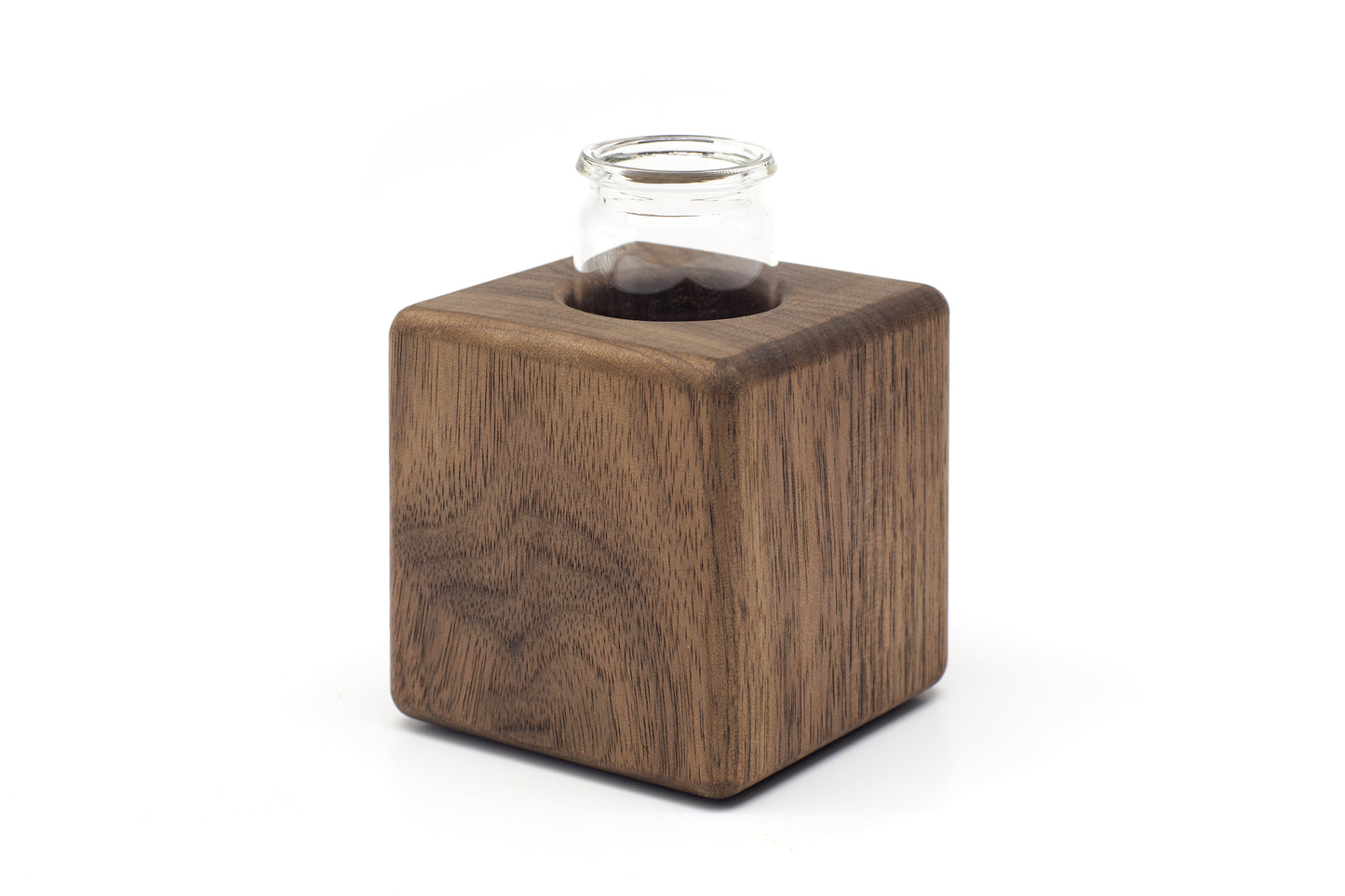 Kleine Vase aus Massivholz mit Glaseinsatz